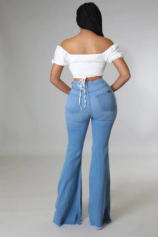 Knee Rip Flare Jean in Medium Wash Wäre Rare Fashion