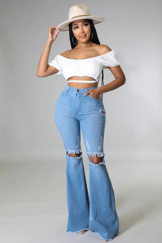 Knee Rip Flare Jean in Medium Wash Wäre Rare Fashion