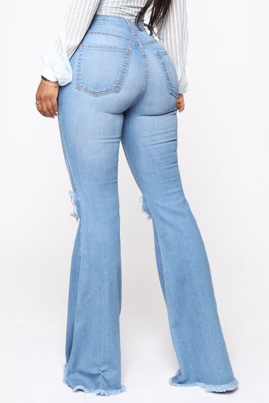 Knee Rip Flare Jean in Medium Wash Wäre Rare Fashion