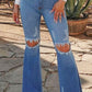 Knee Rip Flare Jean in Medium Wash Wäre Rare Fashion