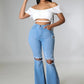 Knee Rip Flare Jean in Medium Wash Wäre Rare Fashion