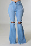 Knee Rip Flare Jean in Medium Wash Wäre Rare Fashion